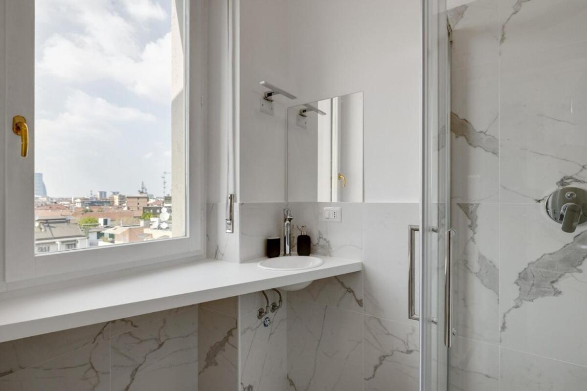 Homeby, Cozy Penthouse Apartment มิลาน ภายนอก รูปภาพ